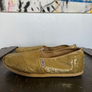 Toms Gold Flats with Shimmering Finish and Textured Fabric